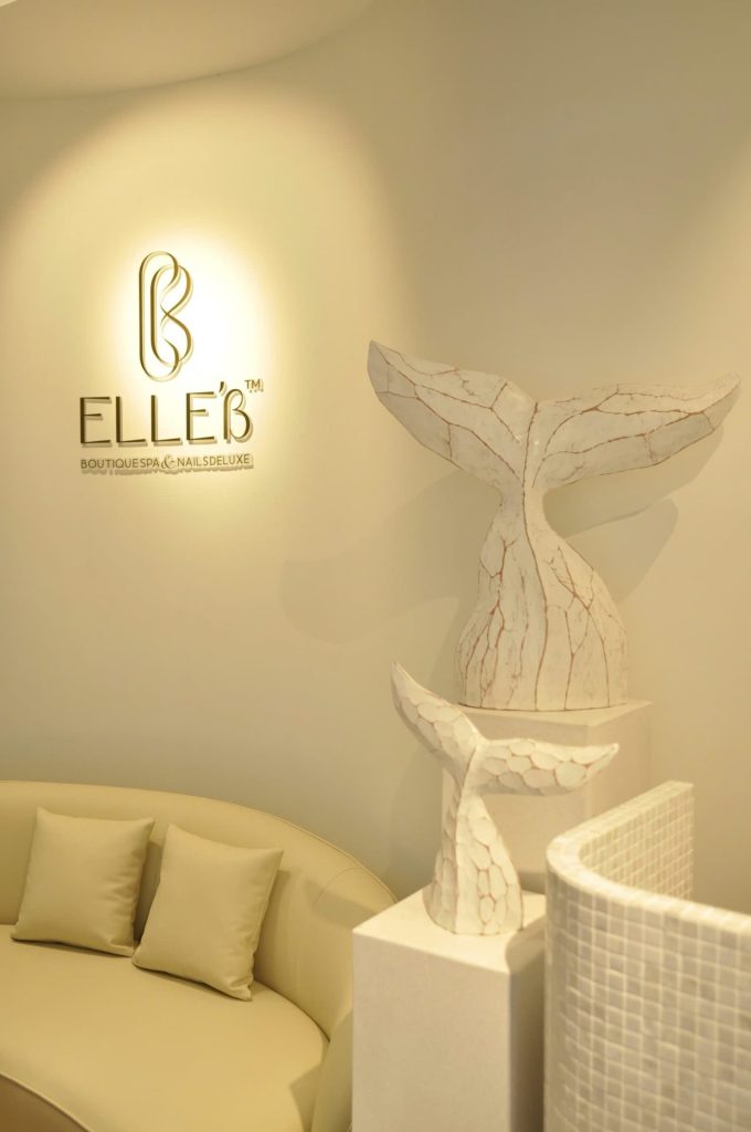 Professional spa therapy setting with massage bed and soft lighting